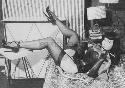 ./Bettie Page with cigarette holder.jpg